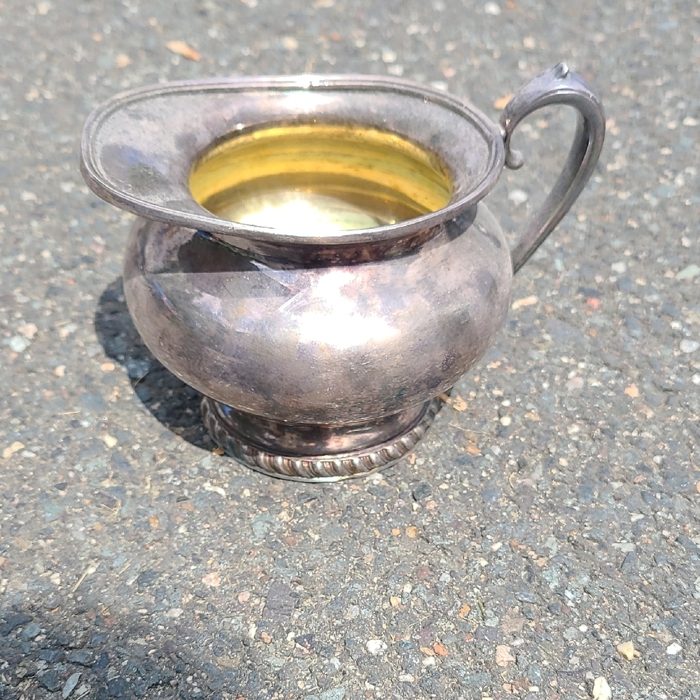 Silver and Gold Tone Pitcher